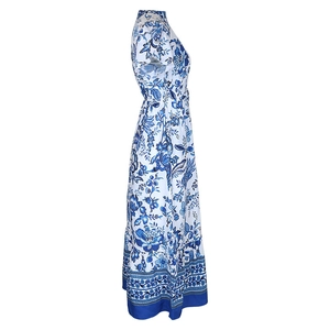Detail of blue and white floral print maxi dress with elegant A-line silhouette and waist cut