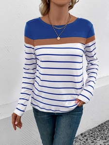 Detail of color-block striped long sleeve shirt with navy blue and brown paneling
