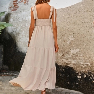 Beige backless maxi sundress with bow shoulder straps and smocked back detail