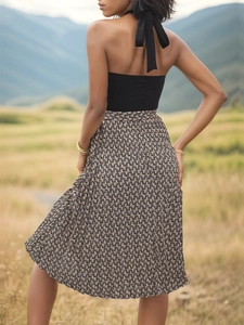 Haut dos nu à licou pour femme avec jupe plissée mi-longue à motif géométrique