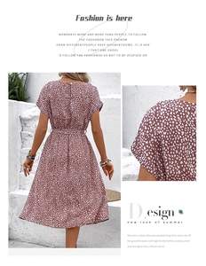 Detail of floral chiffon dress sleeve showing light pink fabric and delicate white prints