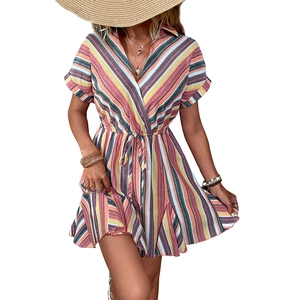 Colorful striped V-neck summer dress with waist tie and ruffle hem in a vacation style