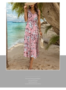 Detail of pink floral sleeveless V-neck dress with drawstring waist and tiered cake skirt