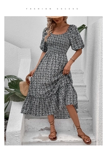Detail of floral backless dress with puff sleeves and smocked bodice for summer