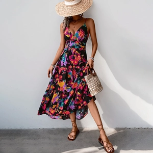Floral print bohemian maxi dress with V-neck and ruffled hem for summer vacations
