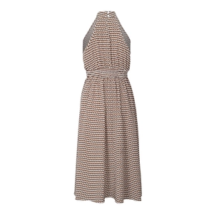 Detail of halter neck dress featuring brown geometric pattern and waist smocking