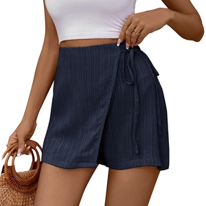Women's navy blue wrap skort with textured fabric and side tie for summer casual style