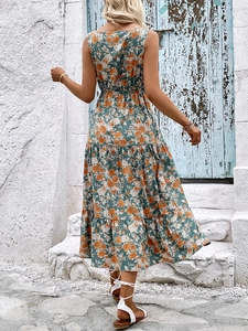 Back view of a summer sleeveless V-neck maxi dress with floral print and tiered skirt