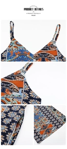 Detailed macro view of bohemian paisley print fabric with side pocket and thin straps
