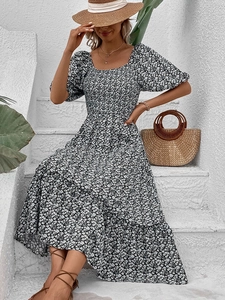 Floral puff sleeve maxi dress with backless tie-up design for summer vacation look