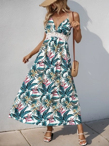 Summer tropical print maxi dress with deep V-neck and lace waist detail for beach holidays