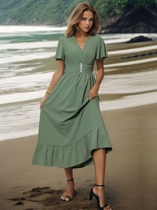 Detail of sage green V-neck midi dress with ruffled sleeves and elastic waist details