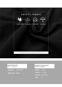 Détail du tissu noir à micro-plis doux et respirant montrant la texture de la robe