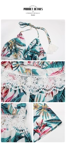Detail of tropical floral print dress with white lace trim and tassel neck ties