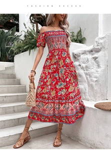 Detail of bohemian red floral off-shoulder maxi dress with smocked bodice and tiered hem