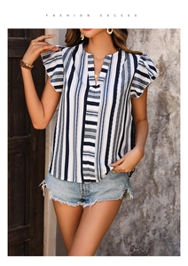 Detail of summer striped V-neck blouse with ruffle cap sleeves and blue stripes