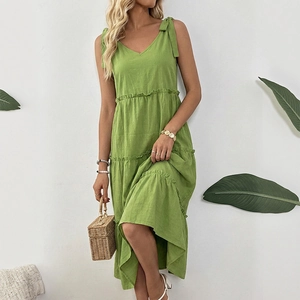 Green V-neck cotton linen tiered maxi dress with adjustable bow shoulder straps