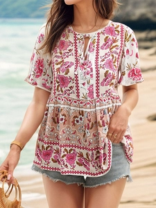 Blouse bohème à fleurs et manches à volants avec col à lacets pour les vacances d'été