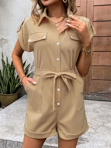 Detailed view of the khaki utility romper showing the lapel collar and button-down front
