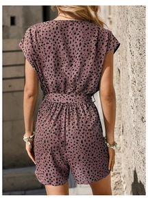 Back view of short leopard print jumpsuit with waist belt and short sleeves