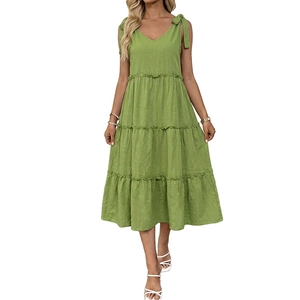 Green sleeveless cotton linen tiered dress with shoulder ties and a deep V-neckline