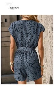 Rear view of women's leopard print romper with short sleeves and waist tie detail