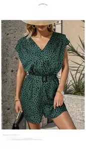 Detail of green leopard print v-neck romper featuring a black waist belt for summer style