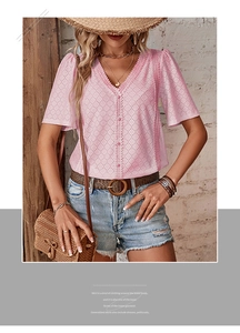 Detail of pink V-neck lace crochet top featuring decorative buttons and hollow knit fabric