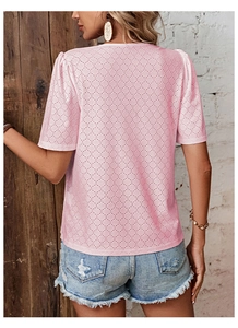 Detailed back view of pink eyelet lace short sleeve top with round neck and ruffled cuffs