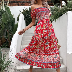 Bohemian off-the-shoulder floral maxi dress in vibrant red with smocked bodice design