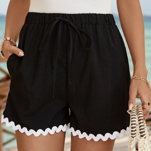 Women's black casual shorts with white rickrack lace trim and elastic drawstring waist
