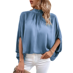 Elegant blue silk blouse with mock neck and batwing slit sleeves for summer wear