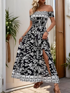 Detail of smocked off-shoulder bodice and high side slit on ethnic print maxi dress