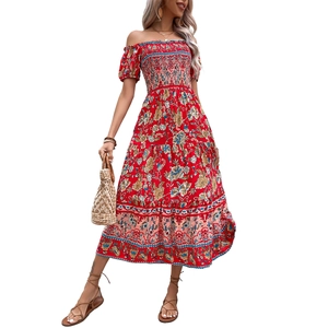 Bohemian floral off-shoulder maxi dress with smocked bodice and layered summer print