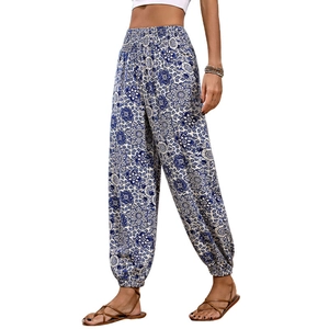Women's high waist bohemian floral harem pants with elastic smocked waist and ankle cuffs