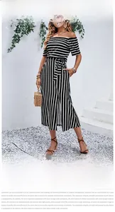 Detail of off-shoulder striped dress featuring a waist tie and elegant side split