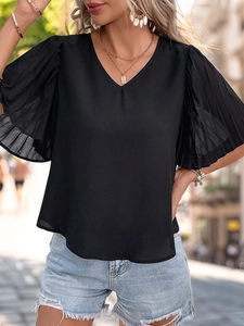 Close-up of black V-neck top with pleated bell sleeves and summer casual styling