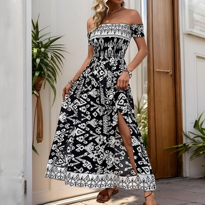 Bohemian black and white off-shoulder maxi dress with high side slit and smocked waist