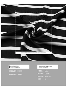 Detailed macro view of soft, breathable black and white striped safety fabric for dresses