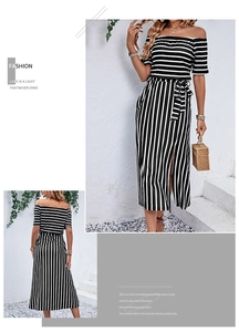 Detail showing the side slit design and black and white stripes of the summer dress