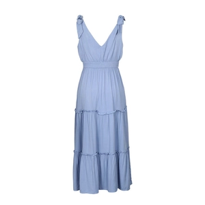 Detail of light blue tiered dress featuring smocked waist and tie-up shoulder straps