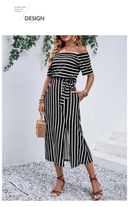 Detail of striped off-shoulder dress featuring waist tie belt and front slit hemline