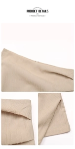 Close-up of beige textured culottes fabric showing vertical seersucker ribbing details
