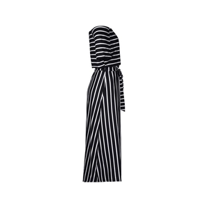 Detail of striped off-shoulder jumpsuit with waist tie and mixed pattern texture