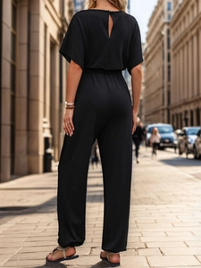 Detail view showing the elegant keyhole cutout on the back of the black summer jumpsuit