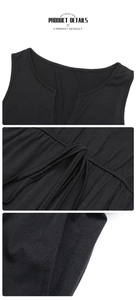 Macro shot of V-neckline detail and pleated stitching on black sleeveless jumpsuit