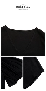 Detail view of the black V-neckline and micro-pleated fabric texture on this summer top