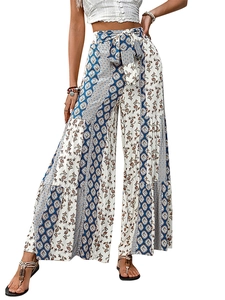 Detail of bohemian patchwork print on high-waisted wide-leg summer vacation pants
