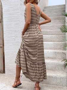 Detail view of summer sleeveless maxi dress with geometric diamond print and ruffle hem