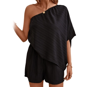 Chic black one-shoulder jumpsuit with vertical pleated texture for summer fashion style